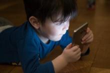 Child looking at mobile